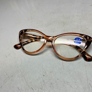 Classic horn rimmed cats eye reading glasses with a blue light filter.